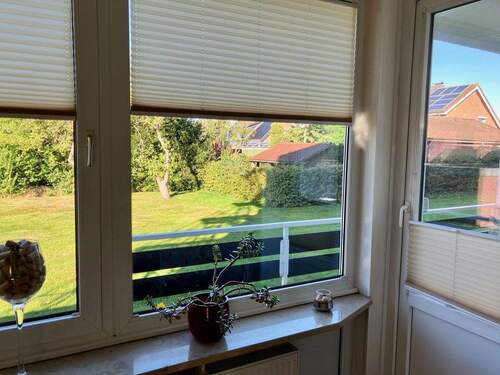 Blick in den Garten - Etagenwohnung mit 79,00 m&sup2; in Fehmarn zum Kaufen