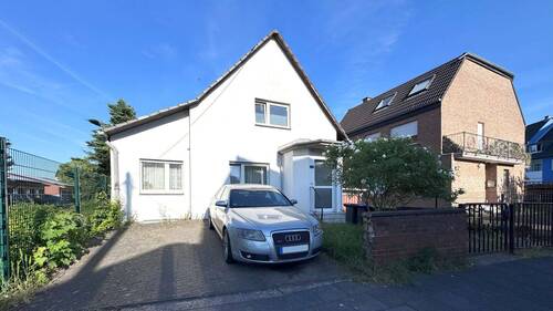 Bild 1 - Kaufpreisreduktion! Attraktives, freistehendes Haus mit schönem Garten in Köln-Godorf