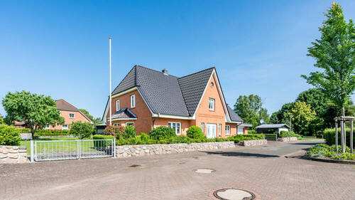 Bild 1 - Jede Menge Platz! Großes Einfamilienhaus mit Garage in familiengerechter Sackgassenlage von Fockbek