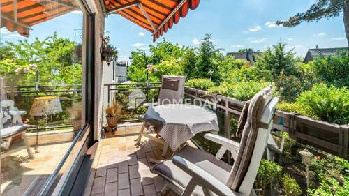 Balkon 1 - Charmante 3-Zimmer-Eigentumswohnung mit Westbalkon, Gemeinschaftsgarten und Einzelgarage