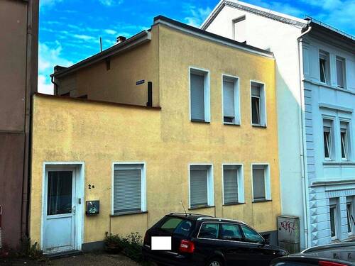 Ansicht - Zweifamilienhaus - 90.000,00 EUR Kaufpreis, ca.  114,00 m² Wohnfläche