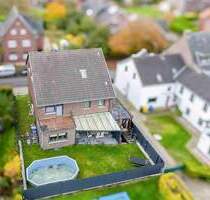 Gepflegtes Einfamilienhaus samt Garten zzgl. 54 qm Gewerbeeinheit, Garage und Stellplatz in Waldniel - Schwalmtal