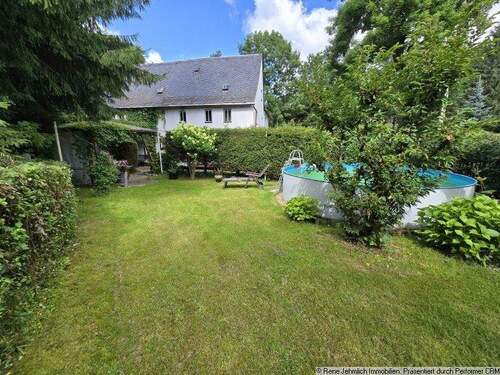 Ansicht 1 - Sanierungsbedürftiges EFH mit 212qm auf 1.770qm Grundstück mit Pool & Doppelgarage + Gartenhaus