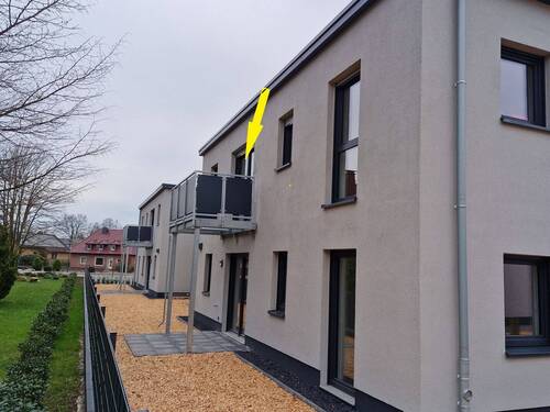 Seitenansicht - moderne DG-Wohnung mit Balkon im Zentrum von Barßel
