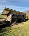 Garten mit Holzlager - 
