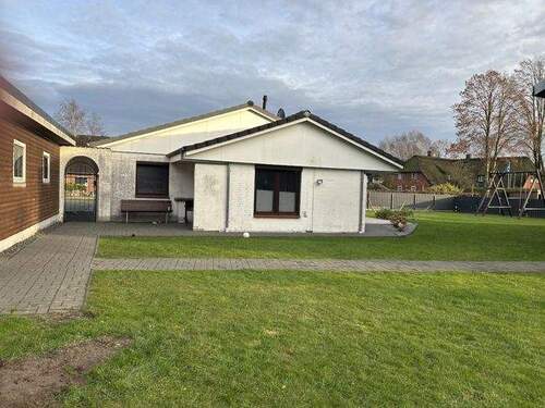 seitliche Ansicht vom Garten aus - Einfamilienhaus mit 129,00 m² in Oldersbek zum Kaufen