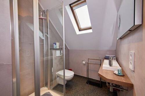 Bad eines der Gästezimmer - 