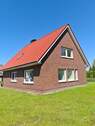 Ansicht - 7 Zimmer Mehrfamilienhaus, Wohnhaus zum Kaufen in Zetel