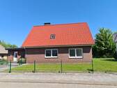 Seitenansicht - 7 Zimmer Mehrfamilienhaus, Wohnhaus in Zetel
