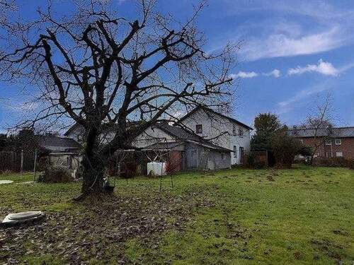 Gartenansicht - Mehrfamilienhaus, Wohnhaus mit 110,00 m&sup2; in Vlotho zum Kaufen