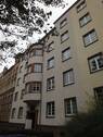 Hausansicht - Inkl. EBK ebenerdige Terrasse frei ab 1.12.25 komplett zum Innenhof