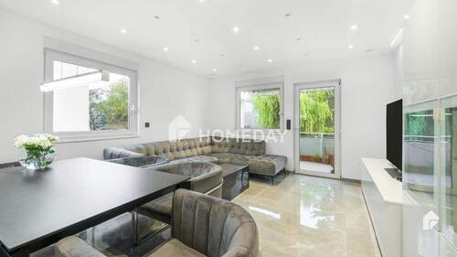 Wohnzimmer 2 - Luxuriös und komplett möbliert: Hochwertige 4-Zimmer-Wohnung mit EBK, Loggia, Fitnessbereich und TG