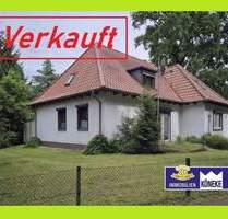 Walmdach Winkelbungalow mit Teilkeller, Doppelgarage, in begehrter Lage in Fahrenhorst - Stuhr