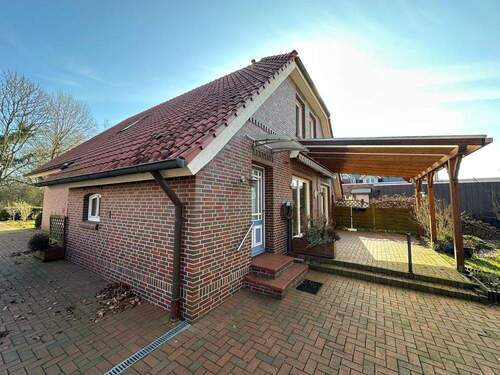 Außenfoto hinten - Einfamilienhaus mit 176,00 m&sup2; in Rhauderfehn zum Kaufen