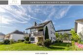 Titelbild - Neu-Isenburg: Mehrgenerationenhaus mit drei Mieteinheiten und attraktivem Baufeld mit Bauvorbescheid