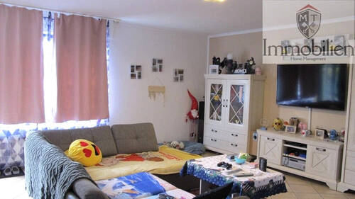 Wohnzimmer EG - 7 Zimmer Mehrfamilienhaus, Wohnhaus zum Kaufen in Lippstadt