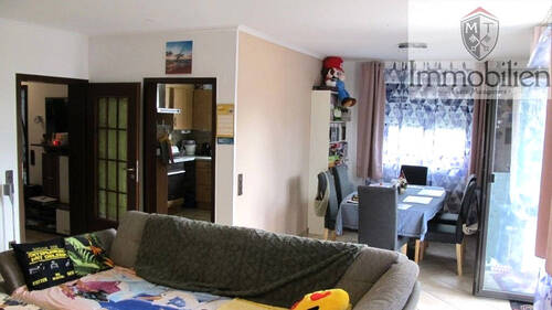 Wohnzimmer EG mit Zugang zur großen Terrasse - 7 Zimmer Mehrfamilienhaus, Wohnhaus in Lippstadt