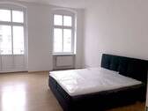 Zimmer2_mit_Bett - Attractive, quiet 3-room apartment with balcony in Friedrichshain