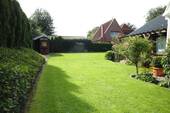 Blick in den Garten - Einfamilienhaus mit 260,00 m&sup2; in Timmendorfer Strand zum Kaufen