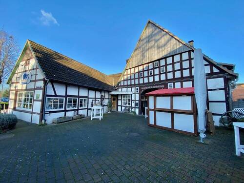 Gebäudeansicht - Rarität - Historisches Fachwerkhaus mit 2 Wohneinheiten + Antiquitätencafé, Nähe Luther See