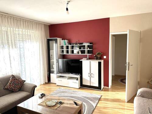 Wohnzimmer - 4 Zimmer Etagenwohnung zum Kaufen in Kriftel