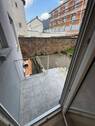 21 Balkon mit Treppe zum Garten und Stellplatz - 