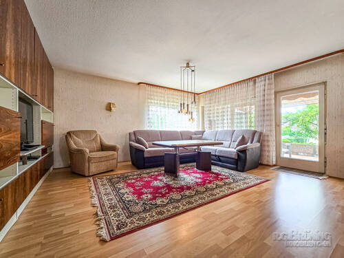 Wohnzimmer mit Ausgang zur Terrasse - 