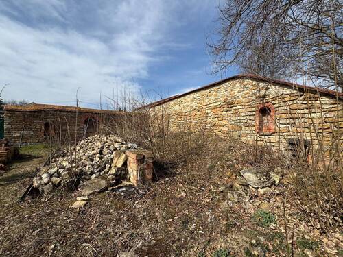 Garten mit Natursteinmauer - 