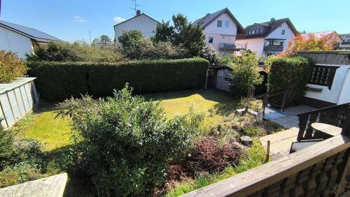 Blick von der Terrasse in den Südgarten - Einfamilienhaus mit 96,00 m&sup2; in Rüsselsheim am Main zum Kaufen