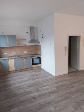 Wohnraum und Küche - Etagenwohnung in Oberthulba