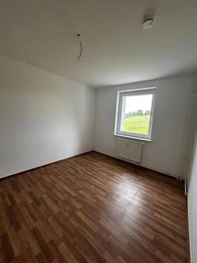 Schlafzimmer - Etagenwohnung mit 49,00 m² in Großröhrsdorf OT Bretnig/Hauswalde zur Miete