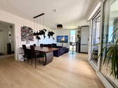 Wohnzimmer - 3-Zimmer-Wohnung im 'WAVE' mit Loggia, zwei Bädern und E-Stellplatz
