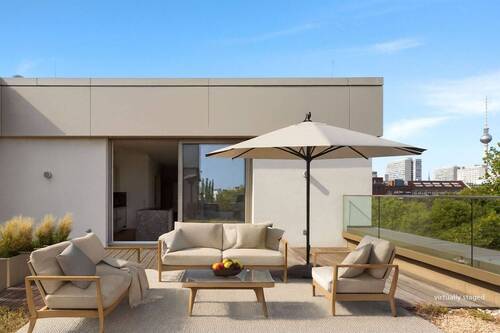 Penthouse Luisenpark terrace staged.jpg - Modernes Penthouse mit Weitblick – XXL-Traumterrasse, Kamin & Blick auf den Fernsehturm