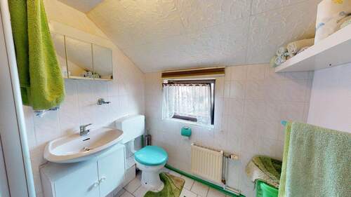 Badezimmer im Obergeschoss - 
