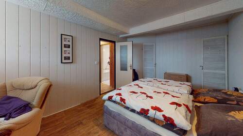 Schlafzimmer im Erdgeschoss - 