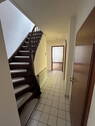 Flur mit Treppe zum 1. OG - 