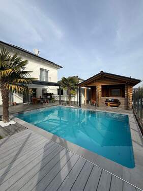 Gartenansicht 1 - *Exklusive Oase in Grünstadt* - 1.249.000,00&nbsp;EUR Kaufpreis, ca.&nbsp; 135,00&nbsp;m&sup2;&nbsp;Wohnfl&auml;che