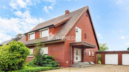 Außenansicht 1 - Großzügiges Einfamilienhaus mit Wintergarten, großem Garten und vielfältigen Nutzungsmöglichkeiten