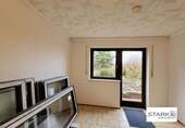 Wohnzimmer zur Terrasse.jpg - Etagenwohnung mit 59,00 m² in Kleinrinderfeld zur Miete