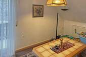 Dachgeschoss Zimmer mit Balkon - 