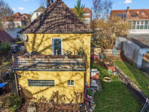 Gartenansicht - Freistehendes Einfamilienhaus in begehrter, ruhiger Wohnlage - mit Gartenidylle und viel Gestaltungspotenzial