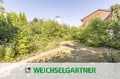 Im Alleinauftrag - Ansprechendes Baugrundstück für zwei Baukörper in ruhiger Wohnlage mit Südwest-Garten