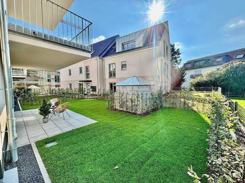 Ansicht - Gartenwohnung mit 4 Zimmern, Küche, 2 Bädern und Terrasse