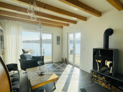 Heller Wohnbereich mit Blick auf den See - Mehrfamilienhaus, Wohnhaus mit 82,80 m&sup2; in Neukieritzsch zum Kaufen
