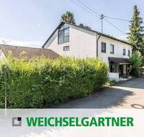 Großzügige Doppelhaushälfte mit sonnigem Garten und geräumiger Doppelgarage - Aschheim