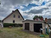 Garagen - Einfamilienhaus mit 115,00 m² in Brück zum Kaufen