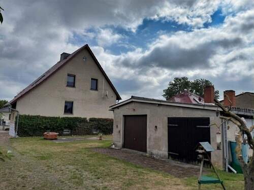 Garagen - Einfamilienhaus mit 115,00 m² in Brück zum Kaufen