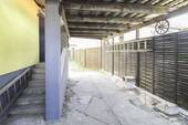 Hauseingang mit Carport - 