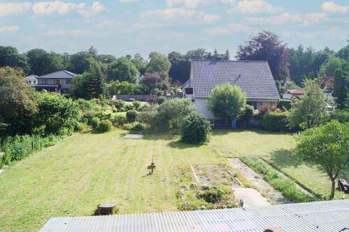 Blick in den Garten - Einfamilienhaus mit 250,70 m&sup2; in Geestland zum Kaufen