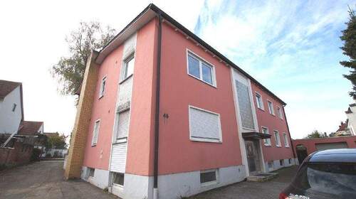 Ansicht - Modernisierte 4 Zimmer-Wohnung mit Terrasse und Garten